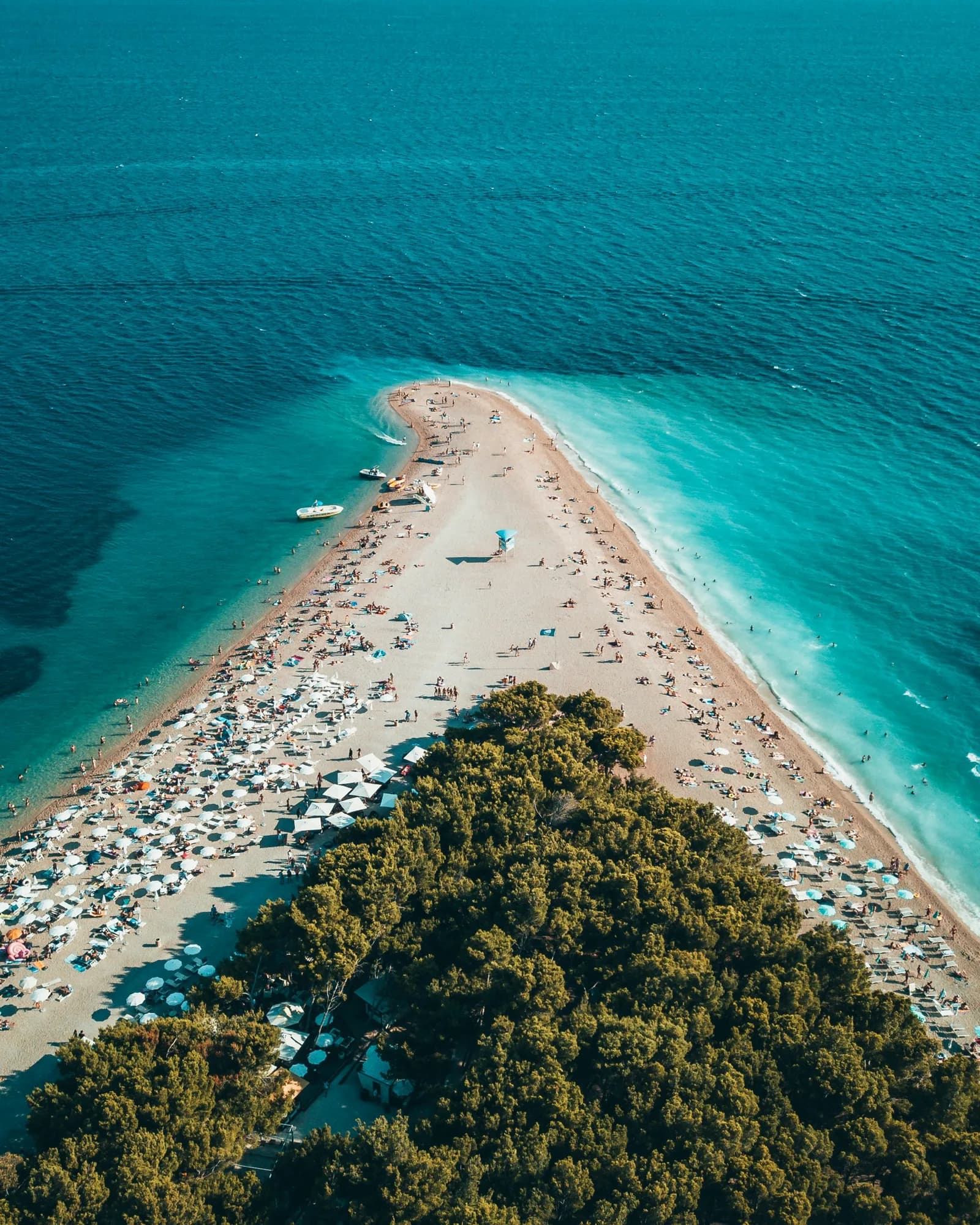 Aerial view of Zlatni Rat beach spit jutting into the Adriatic on Brac