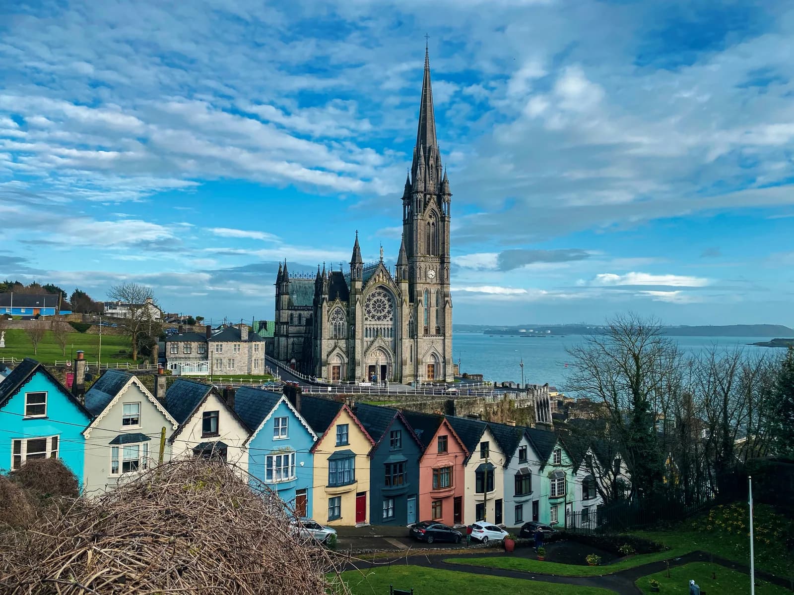 St Colman's Cathedral above the colourful Deck of Cards houses at Cobh, Cork harbour.